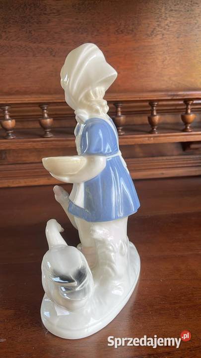Figurka dziewczynki karmiącej gąski Syg GDR i Porcelana i szkło Gdańsk
