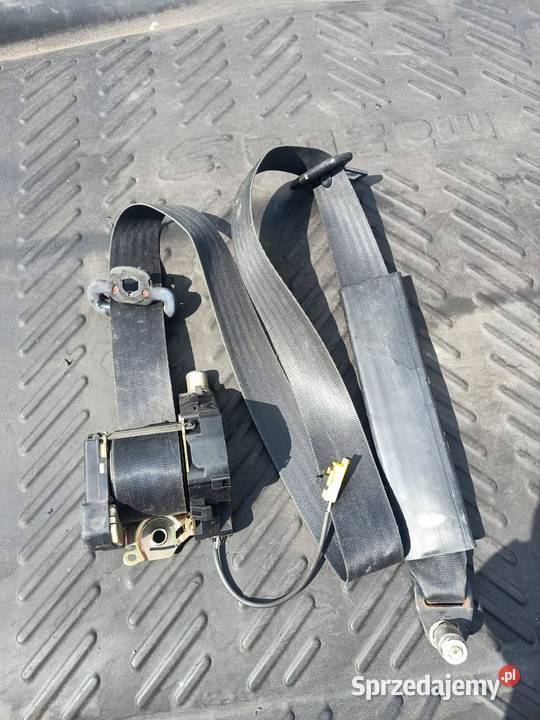 Pas bezpieczeństwa napinacz lewy przód Fiat Szczecin