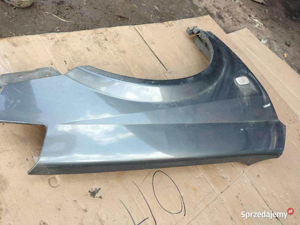 NISSAN PRIMERA P12 BŁOTNIK PRAWY PRZÓD osobowe Kamień-Kolonia