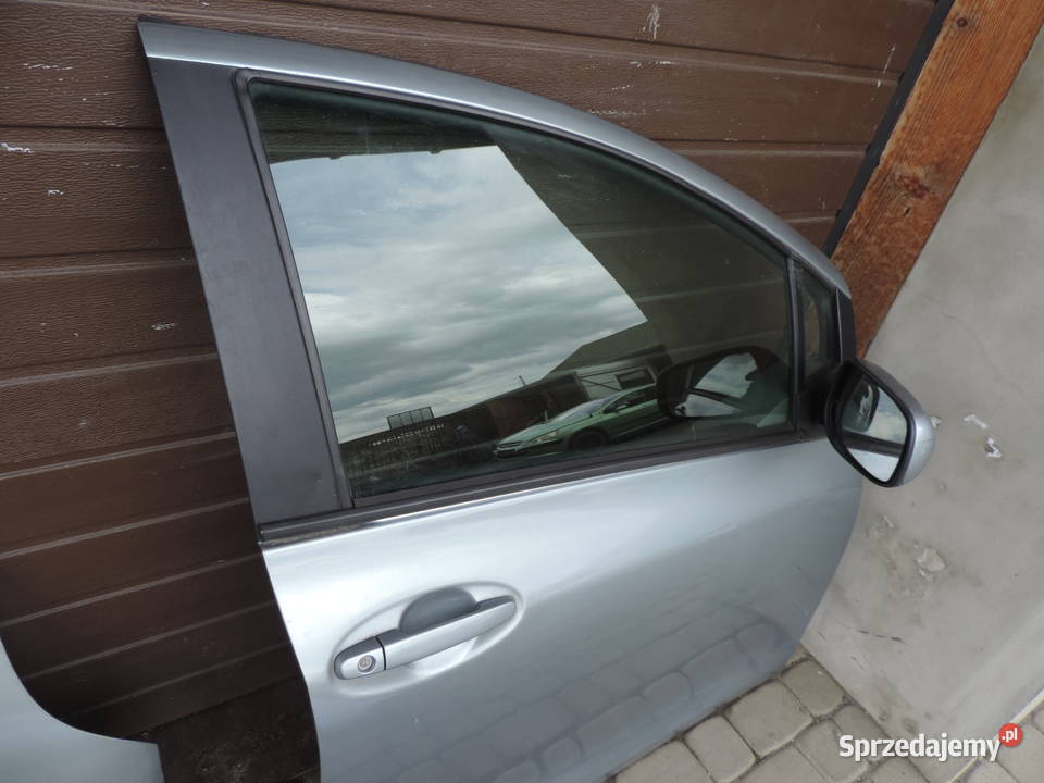 DRZWI PRAWY PRZÓD TOYOTA YARIS II HB 5D 1F8 osobowe Nowy Sącz