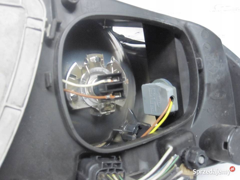 GRAND VOYAGER IV 06r lampa lewa przód 04857833AC osobowe świętokrzyskie