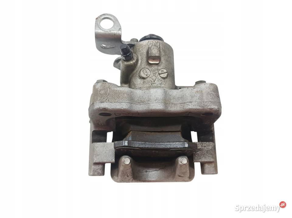 ZACISK HAMULCOWY PRAWY TYŁ 10 TSI 23R Skoda