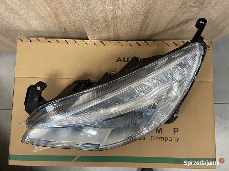 Opel Astra j IV reflektor przód lewy depo Kozubszczyzna sprzedam