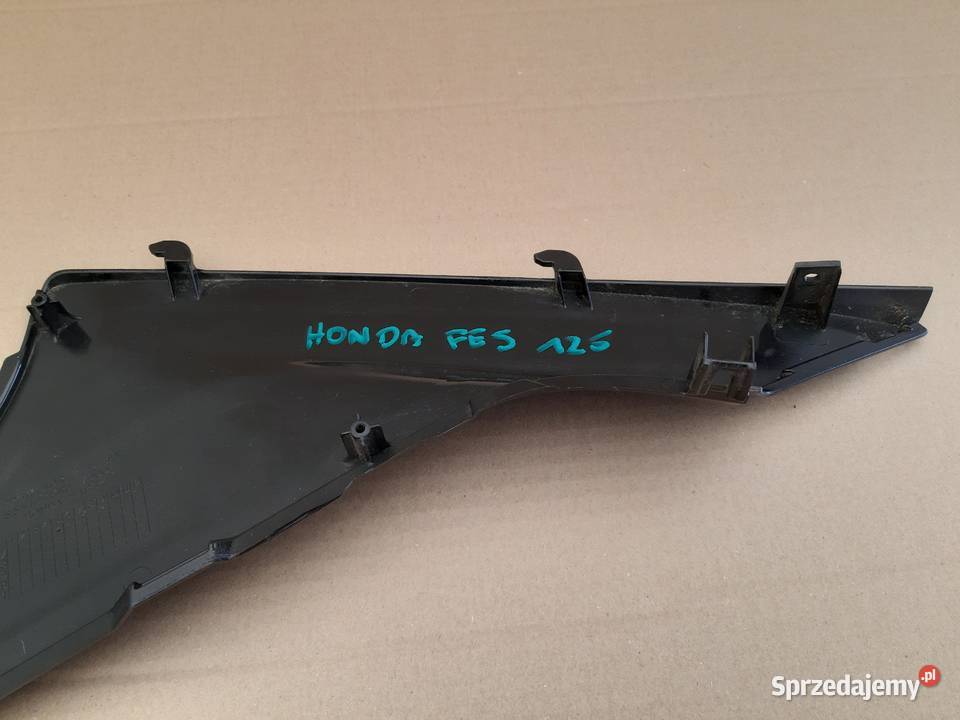 HONDA FES 125 SWING OWIEWKA LEWA OSŁONA BOCZEK Trzciel