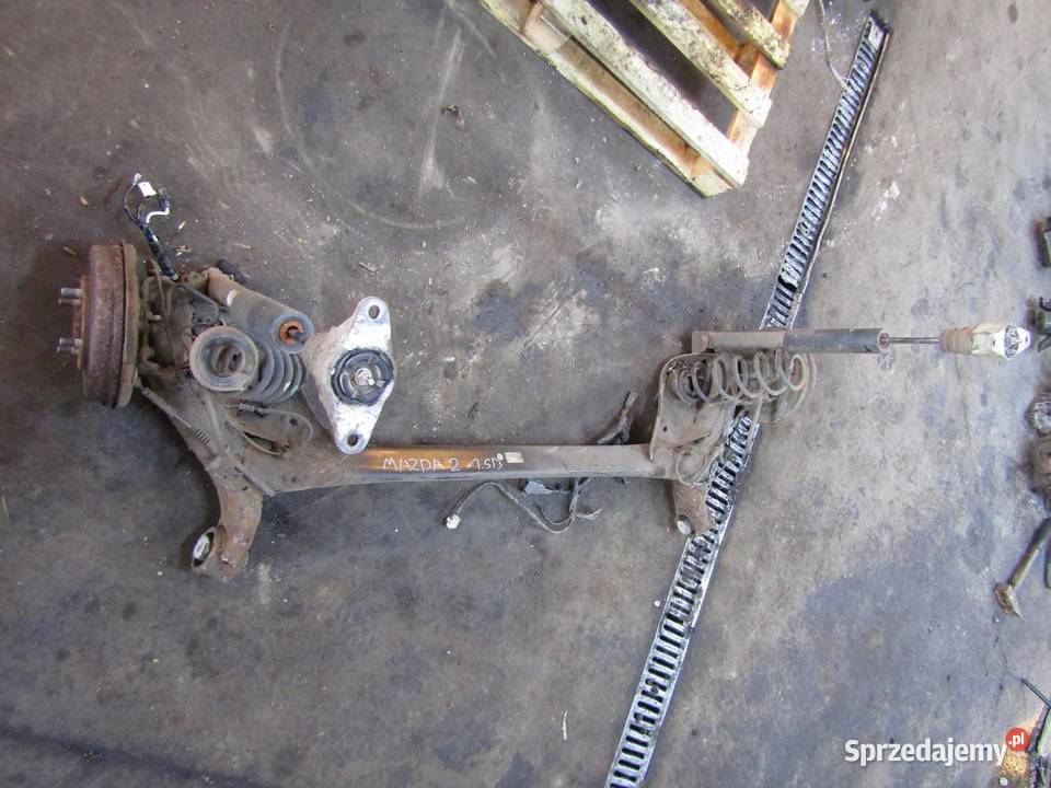 BELKA OŚ ZAWIESZENIA TYŁ TYLNA 15 B MAZDA 2 DJ