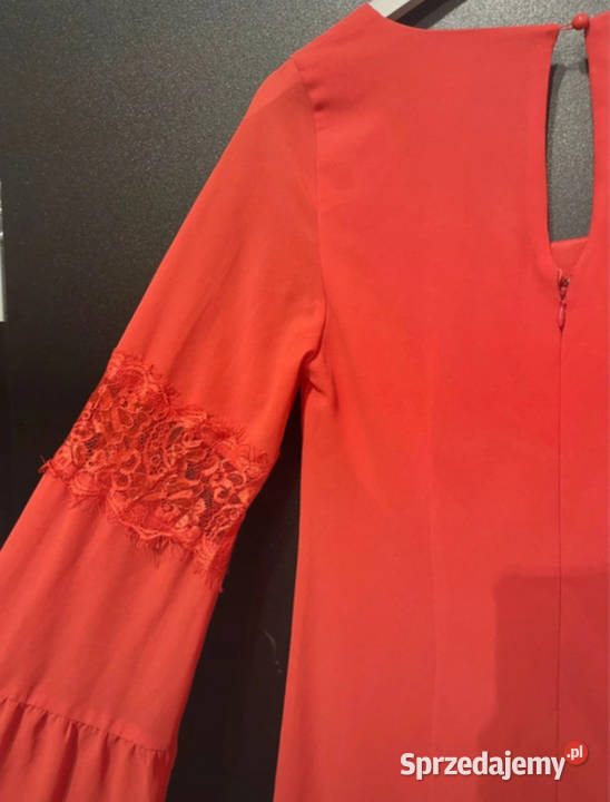 Elegancka różowa sukienka z koronkowymi rękawami Rozmiar 36(S)