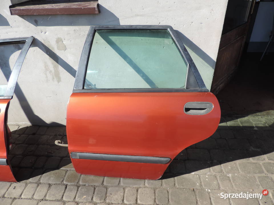 VOLVO V40 I FL DRZWI LEWE TYLNE TYŁ 33822 Nowy Sącz
