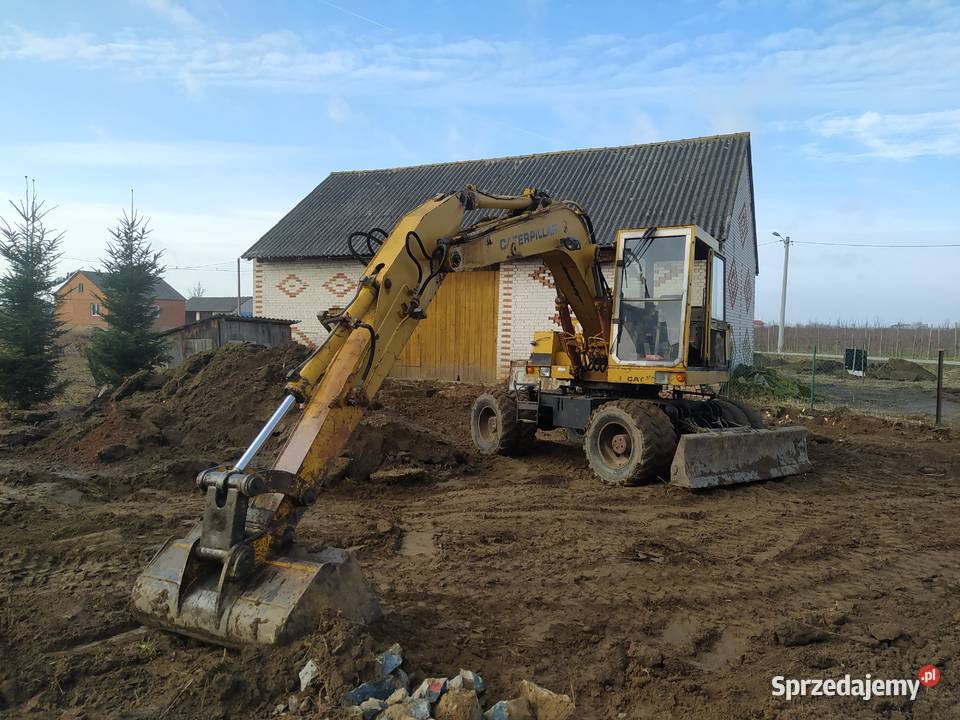 Koparka Caterpillar jcb liebherr Volvo wywrotka Koparki