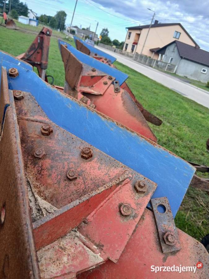 Plug obrotowy 3 skibowy NAUD sprezynaKola Pługi Konin
