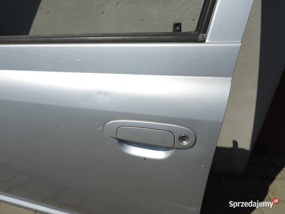 TOYOTA YARIS I HB FL 5D KOLOR 199 DRZWI LEWY Drzwi Nowy Sącz sprzedam