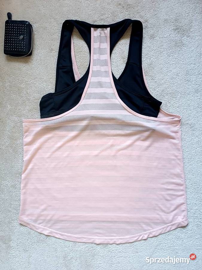 Pudrowo różowa koszulka sportowa na ramiączkach różowy