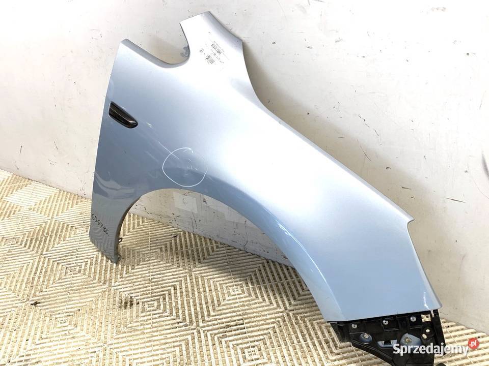 BŁOTNIK PRAWY PRZÓD OPEL ASTRA J SedanLimuzyna osobowe