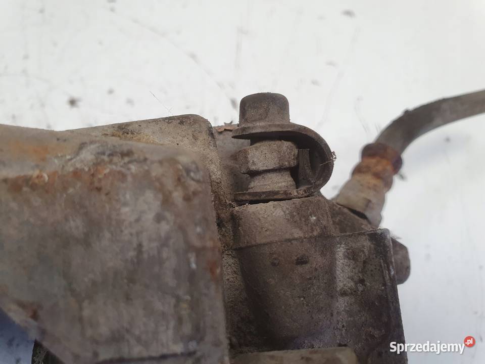 BMW E60 PRZEDNI ZACISK HAMULCOWY prawy przód Rudka