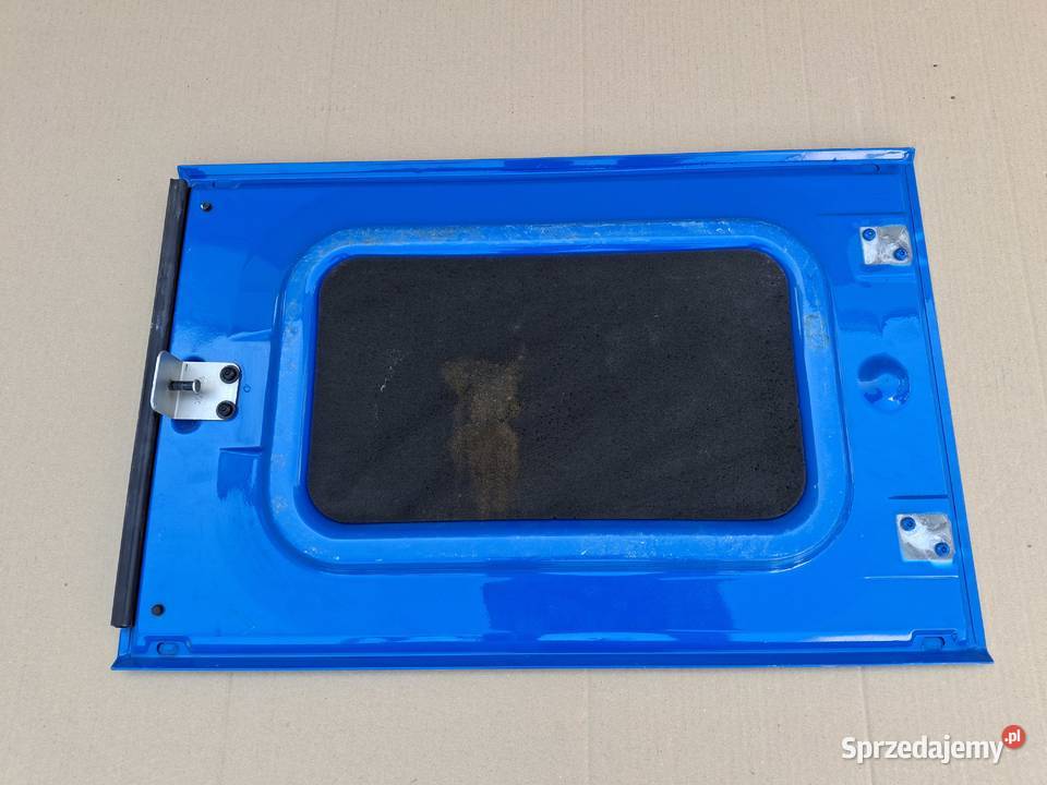 DAF XF 105 106 KLAPA DRZWICZKI SCHOWKA LEWE Bieleń