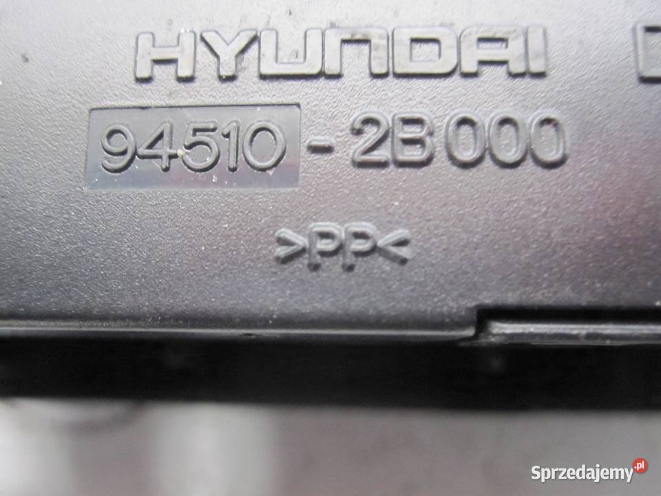HYUNDAI SANTA FE II 06 obudowa radia kratka