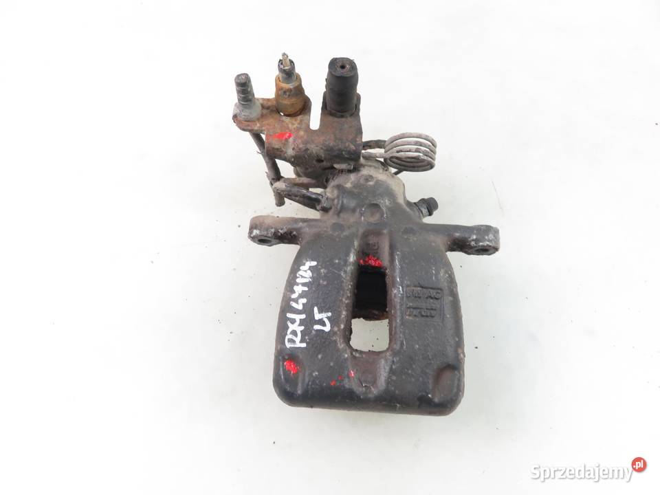 ZACISK LEWY TYŁ VW CADDY III Zaciski i jarzma