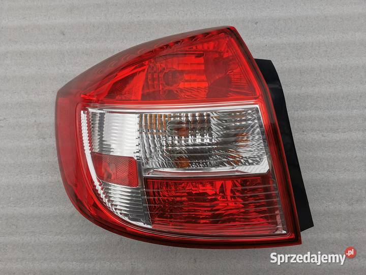 Lampa Lewy Tył Tylna Lewa Suzuki SX4 Sedan KOITO Wyszków