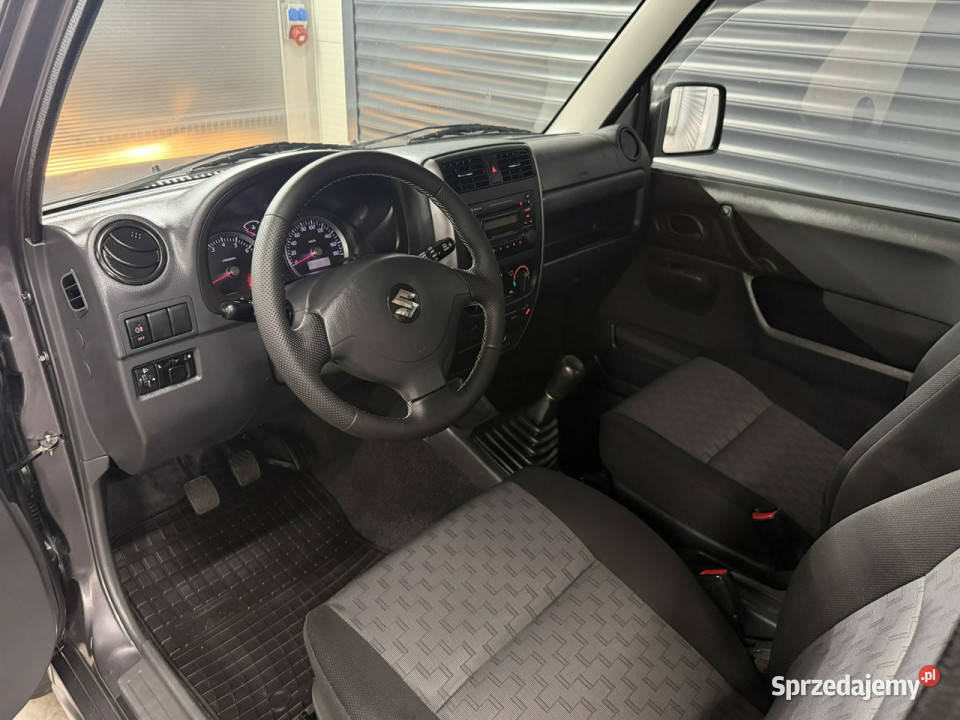 Suzuki Jimny Stan Perfekcyjny 140tyśkm Zero manualna Samochody osobowe Chechło
