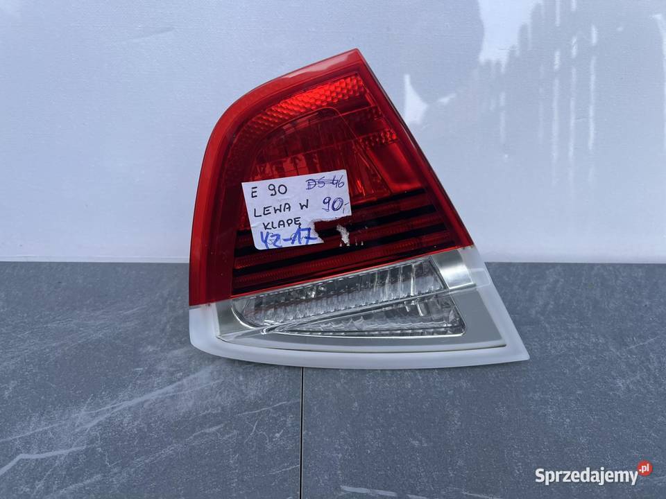 BMW E90 LEWA LAMPA TYŁ W KLAPĘ osobowe Ostroróg