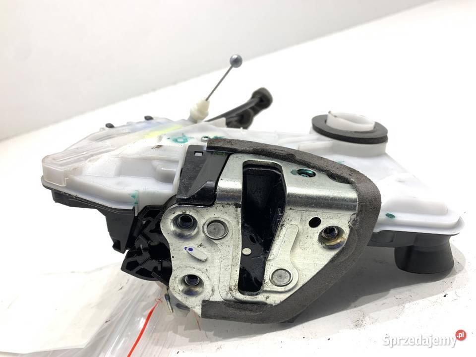 ZAMEK DRZWI PRAWY PRZÓD TOYOTA COROLLA E21