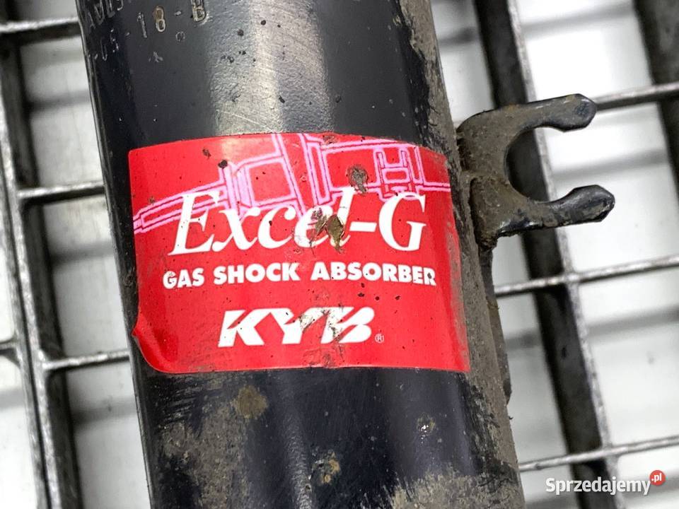 AMORTYZATOR LEWY PRZÓD ZE SPRĘŻYNĄ PEUGEOT 208 I