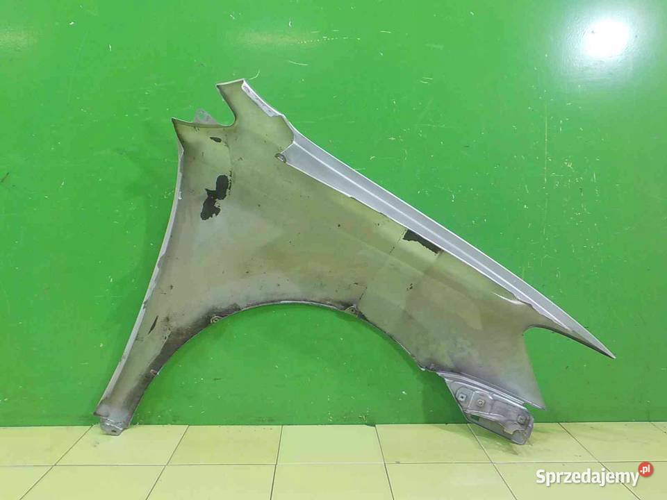 VW POLO V 6R 12 B 10r 5D blotnik lewy przod osobowe Suków