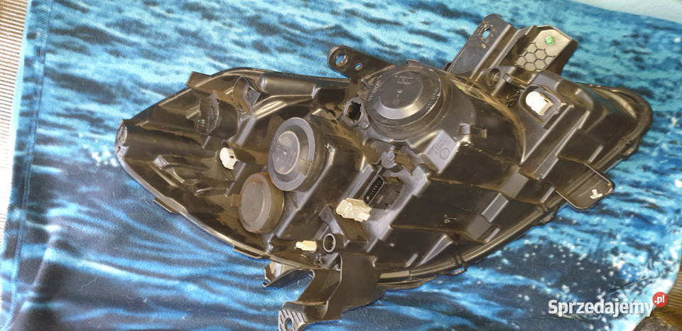 Renault Clio III lewa lampa soczewka 260606716R Przygodzice