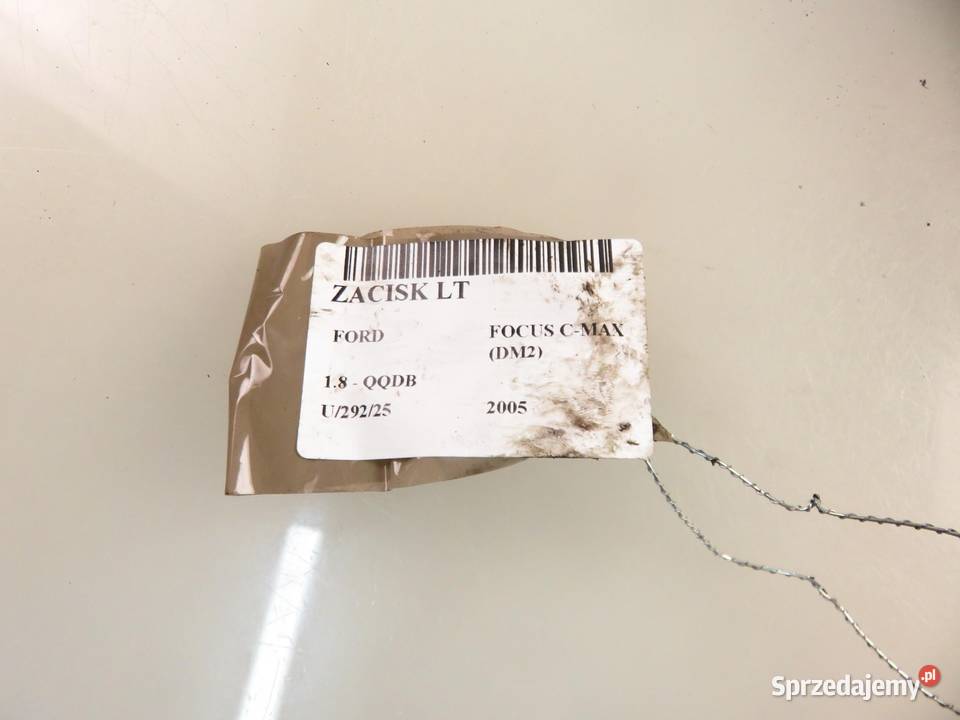 ZACISK LEWY TYŁ FORD FOCUS C DM2 18 QQDB Zaciski i jarzma