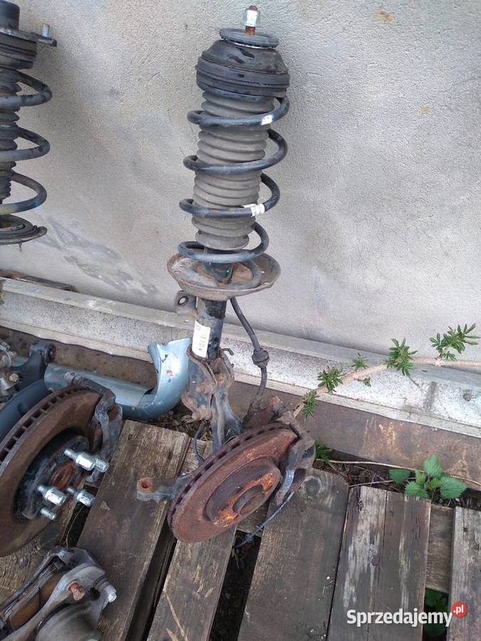 Corsa D 12 08r zwrotnica piasta amortyzator Motoryzacja
