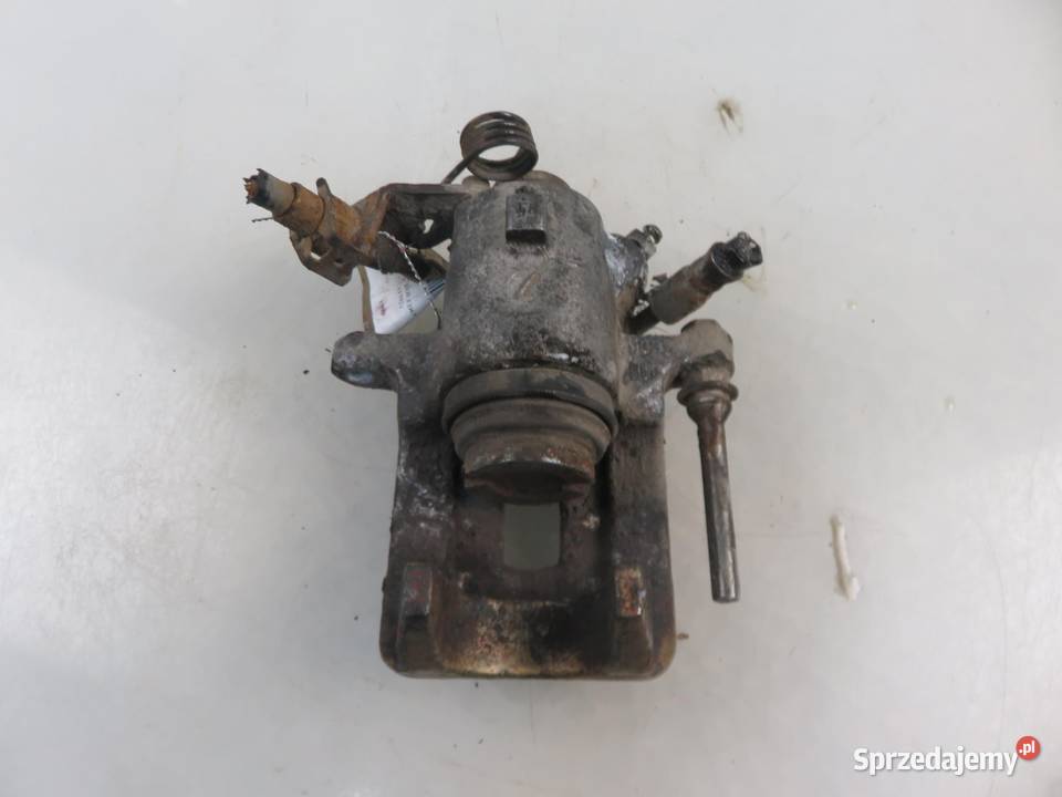 ZACISK LEWY TYŁ SEAT TOLEDO II 19 TDI