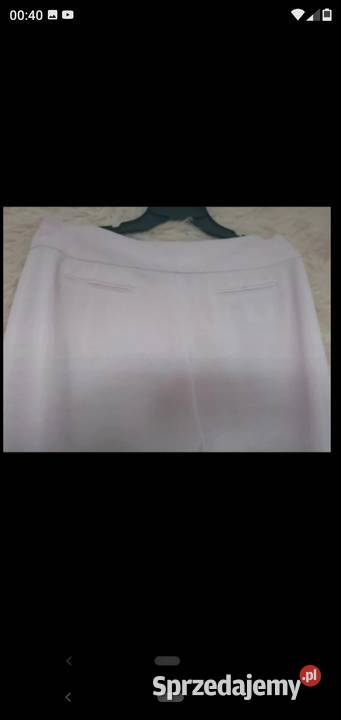 Nowe eleganckie spodnie pudrowy róż szerokie różowy