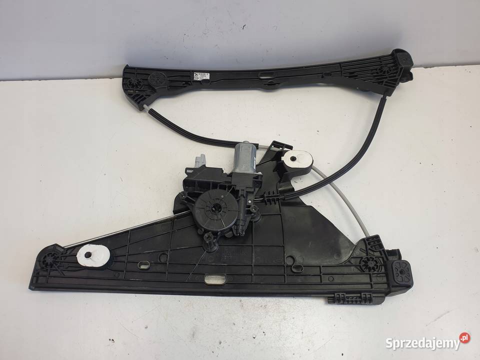 Opel Corsa F MCHANIZM PODOSZENIA SZYBY lewy