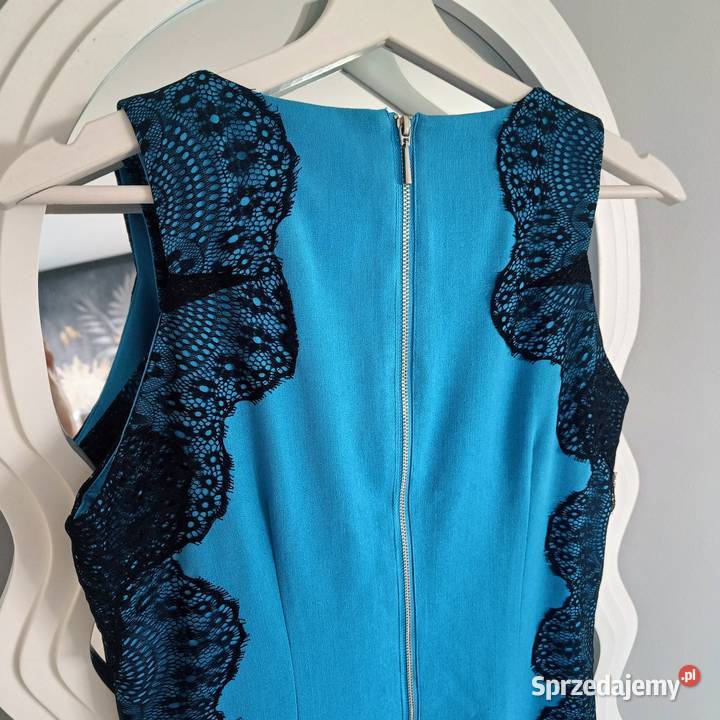 Reserved sukienka bodycon niebieska koronka midi bez rękawa łódzkie Piotrków Trybunalski