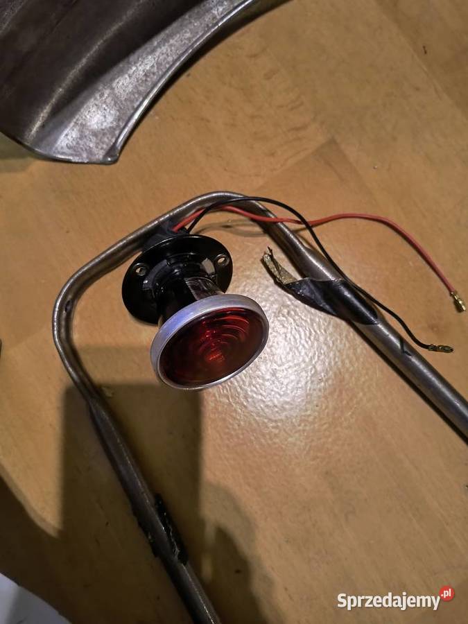 Triumph błotnik tylny lampka podpórka Konin