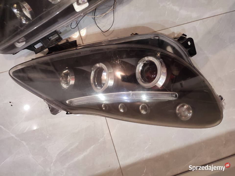 Lampy przednie opel corsa d