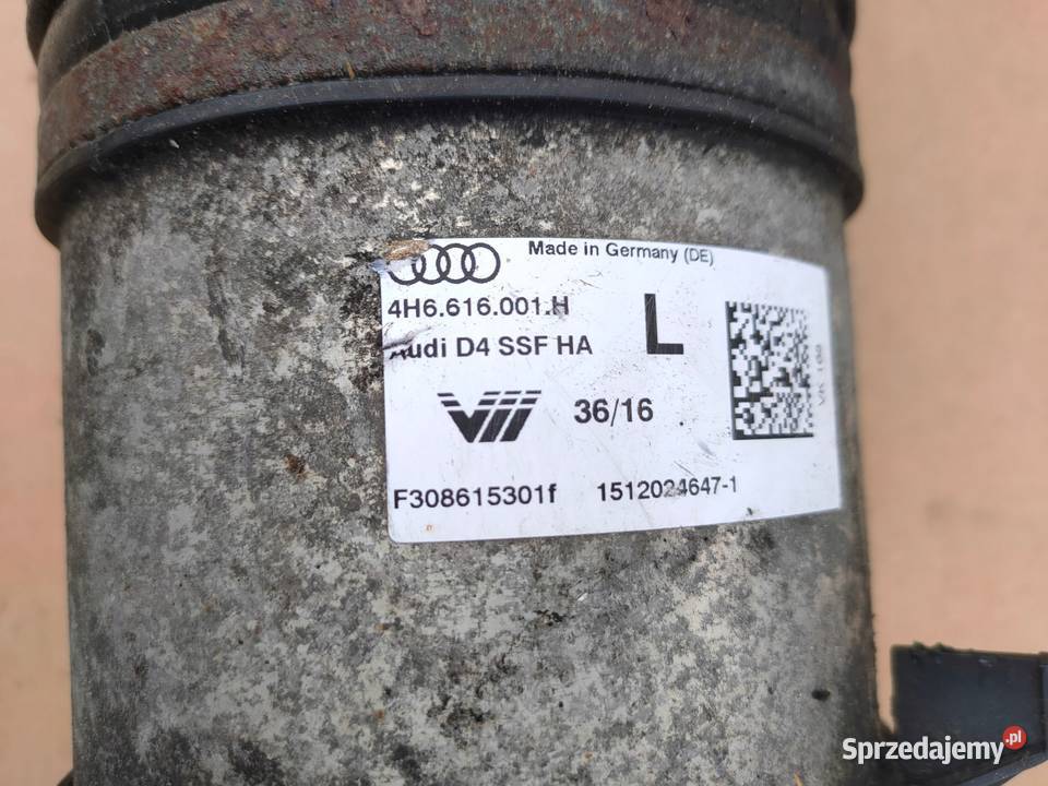 AUDI A8 D4 AMORTYZATOR LEWY TYŁ 4H6616001H TYLNY Przemęt