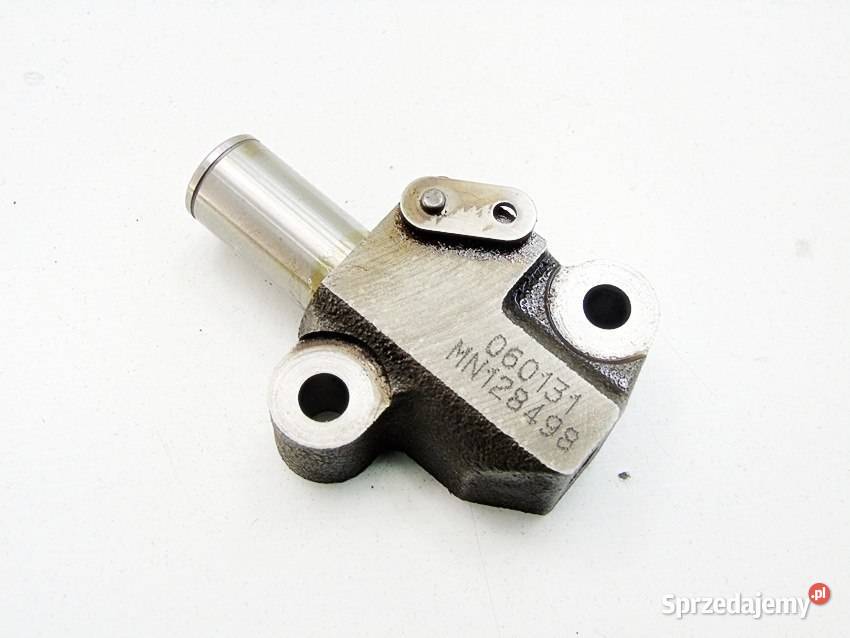 NAPINACZ ŁAŃCUCHA 13 15 16V MITSUBISHI COLT 6 Sosnowiec