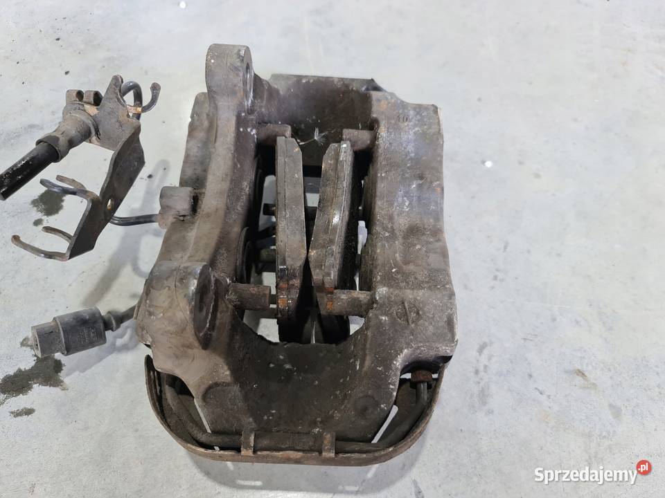 ZACISK HAMULCOWY PRAWY TYŁ AUDI Q7 20767304 Przystajń