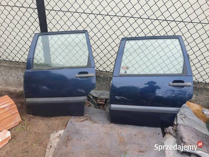 Drzwi tylne lewe lewy tył Volvo 850 granatowe Kraków
