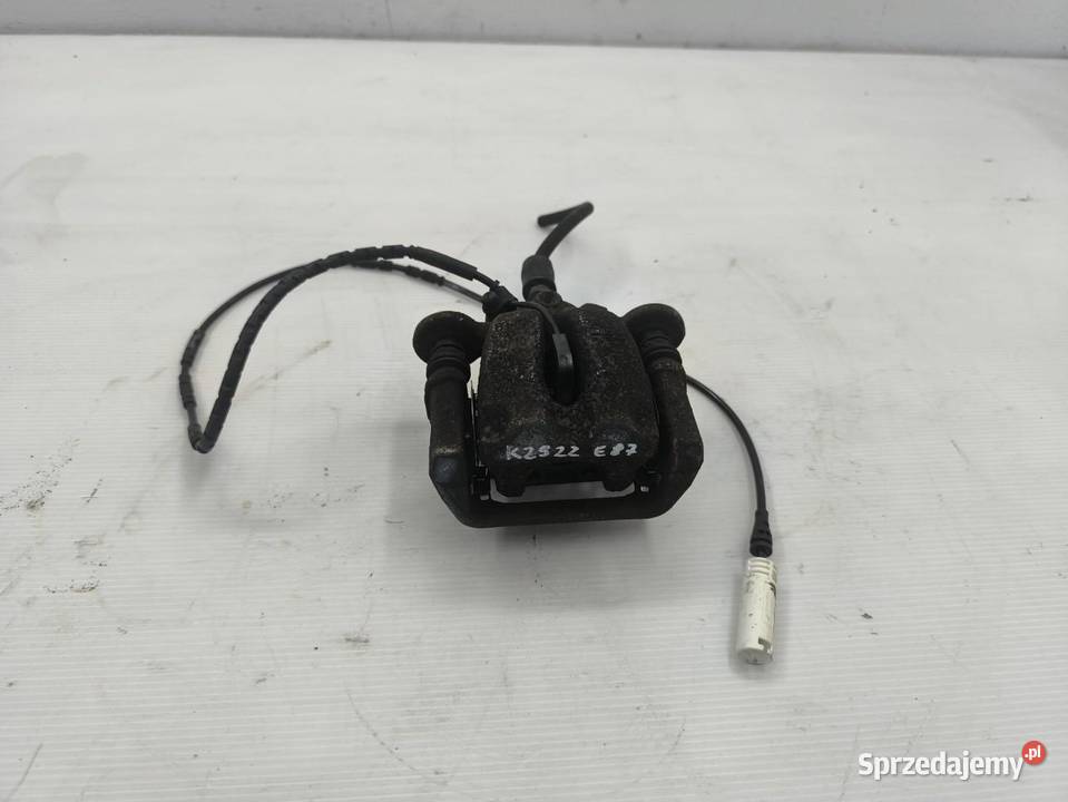 ZACISK LEWY PRZÓD BMW 1 E87 E81 LIFT 16 osobowe wielkopolskie