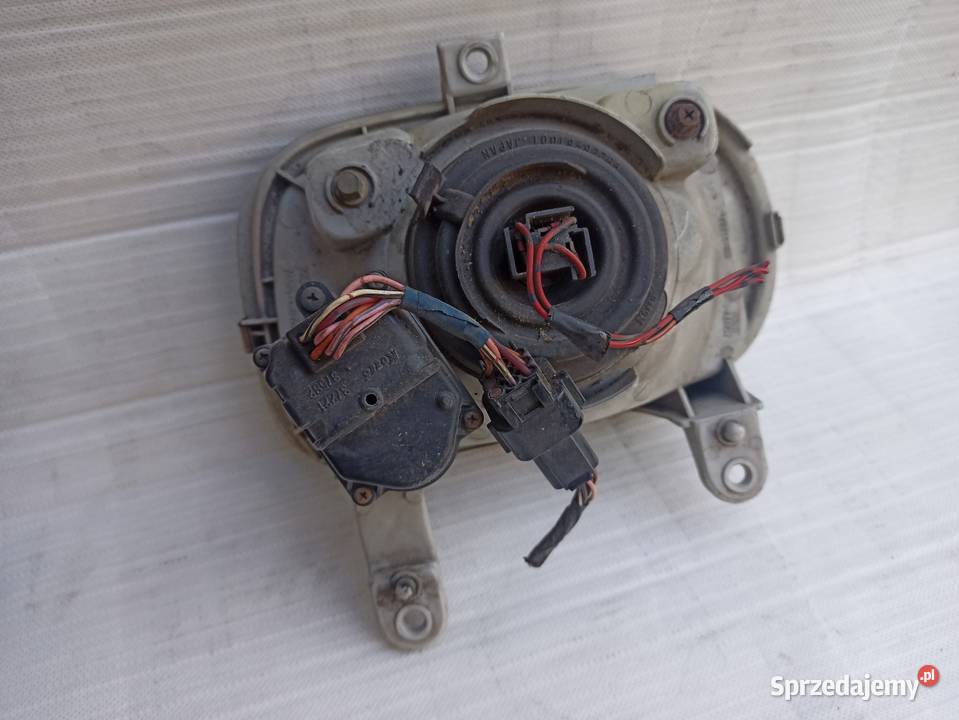 Daihatsu Cuore III 3 L201 lampa przednia lewa osobowe Sieradz