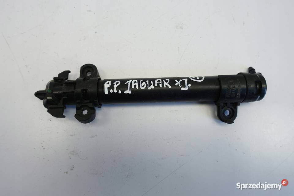 Jaguar XJ X351 SPRYSKIWACZ PRZEDNIEJ LAMPY prawy Wyposażenie wnętrza