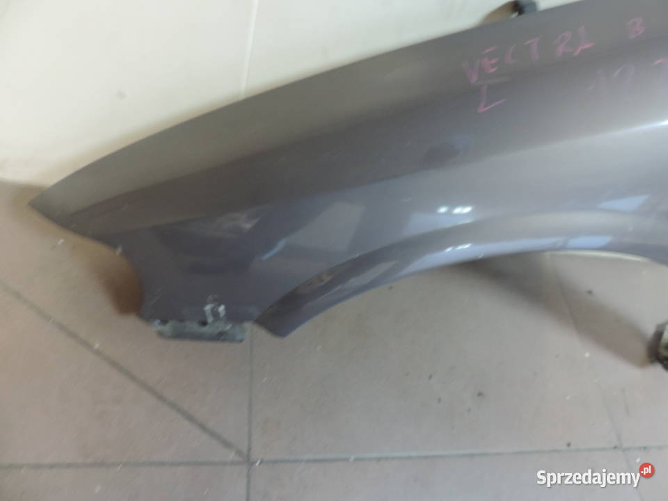 BŁOTNIK LEWY PRZÓD Opel Vectra B