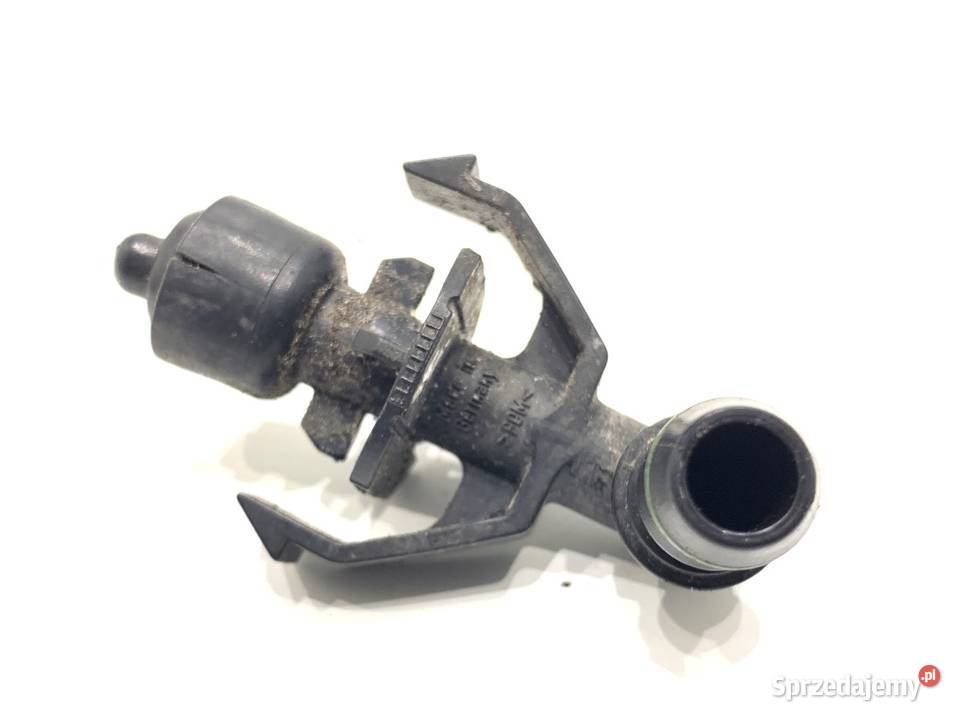 SPRYSKIWACZ REFLEKTORA LEWY PRZÓD BMW E64