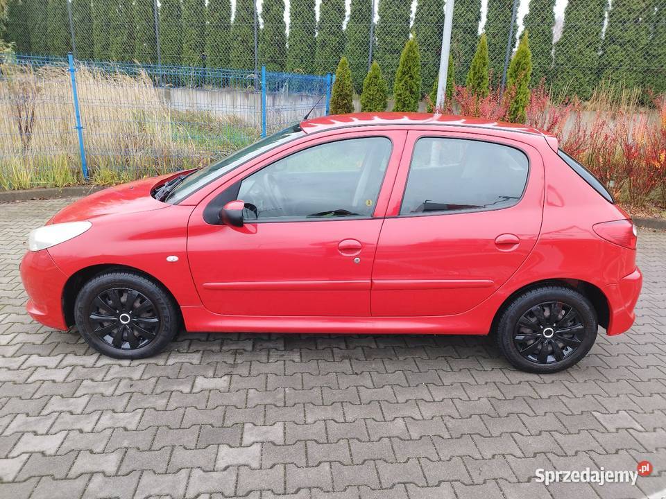 Ekonomiczny Peugot 206 plus 2011 salon Polska czerwony 206 plus wielkopolskie Jarocin