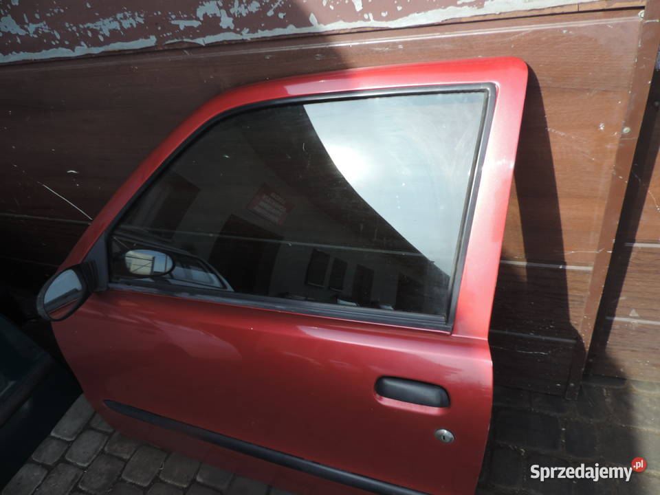 FIAT SEICENTO DRZWI LEWE PRZEDNIE KOLOR 124B osobowe Nowy Sącz