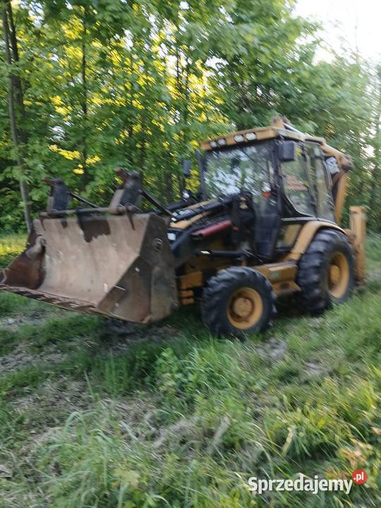 Koparko ładowarka caterpillar 428c 438 c małopolskie