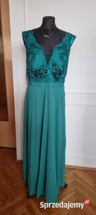 Sprzedam śliczną butelkowo zieloną sukienkę