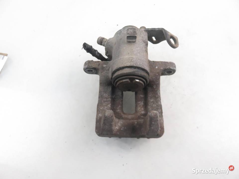 ZACISK PRAWY TYŁ AUDI A3 8L1 16 AVU Układ hamulcowy
