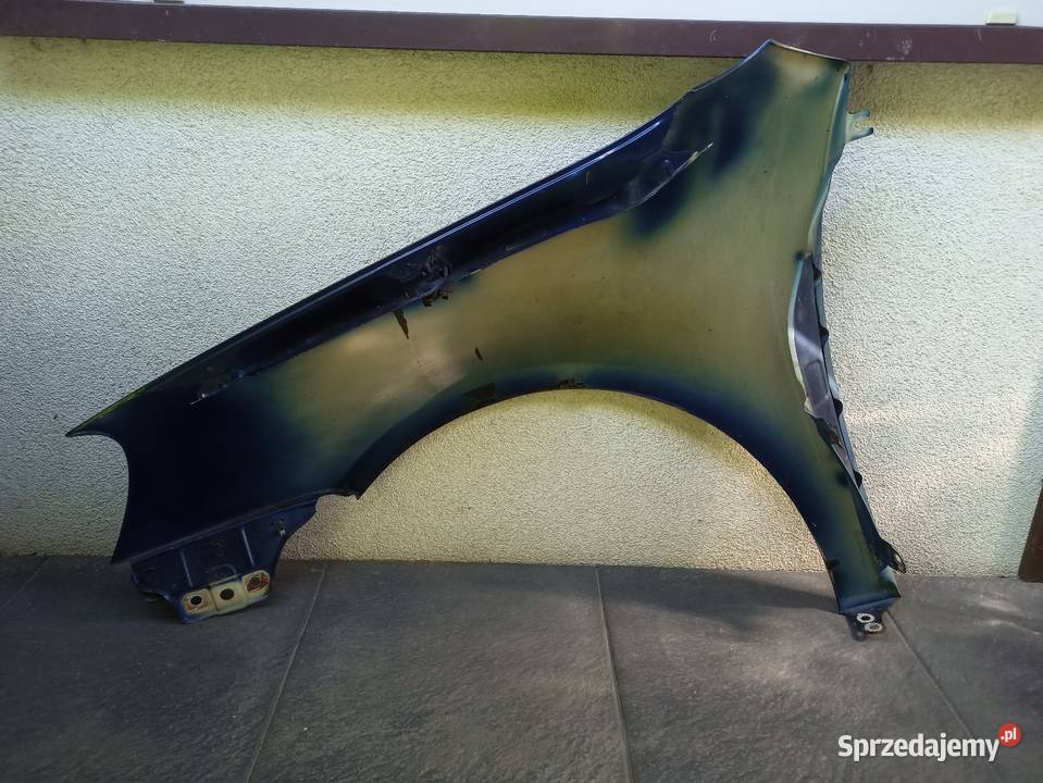 VW Golf V 5 błotnik przedni prawy granatowy LD5Q Sieradz